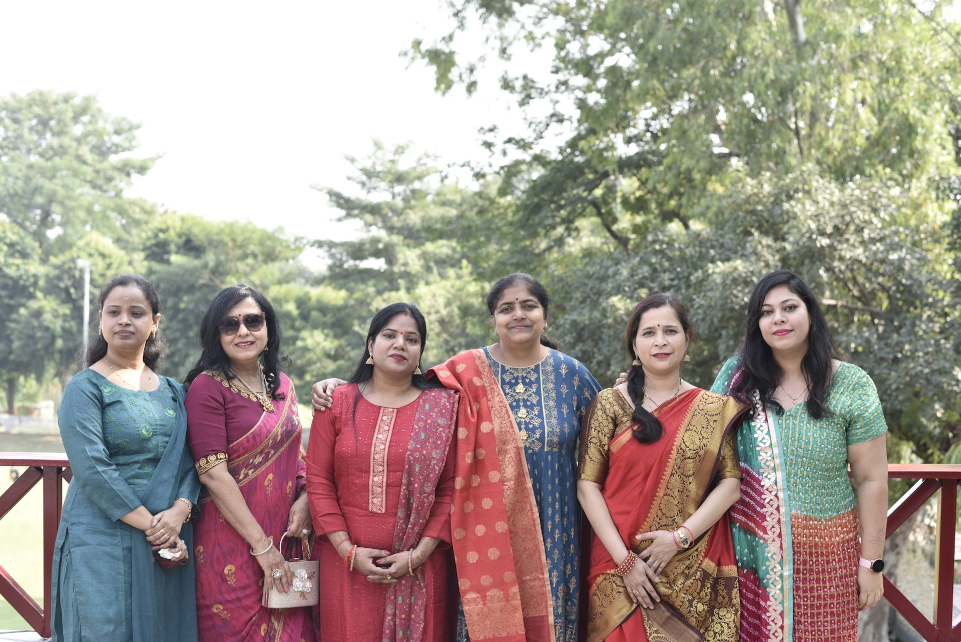a group of women standing next to each other